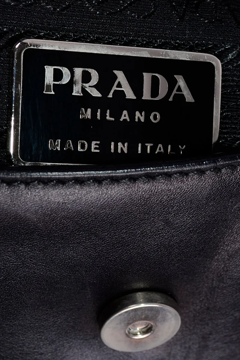 RESERVED // 1990s Prada Black & White Perforated Leather Top Handle Handbag