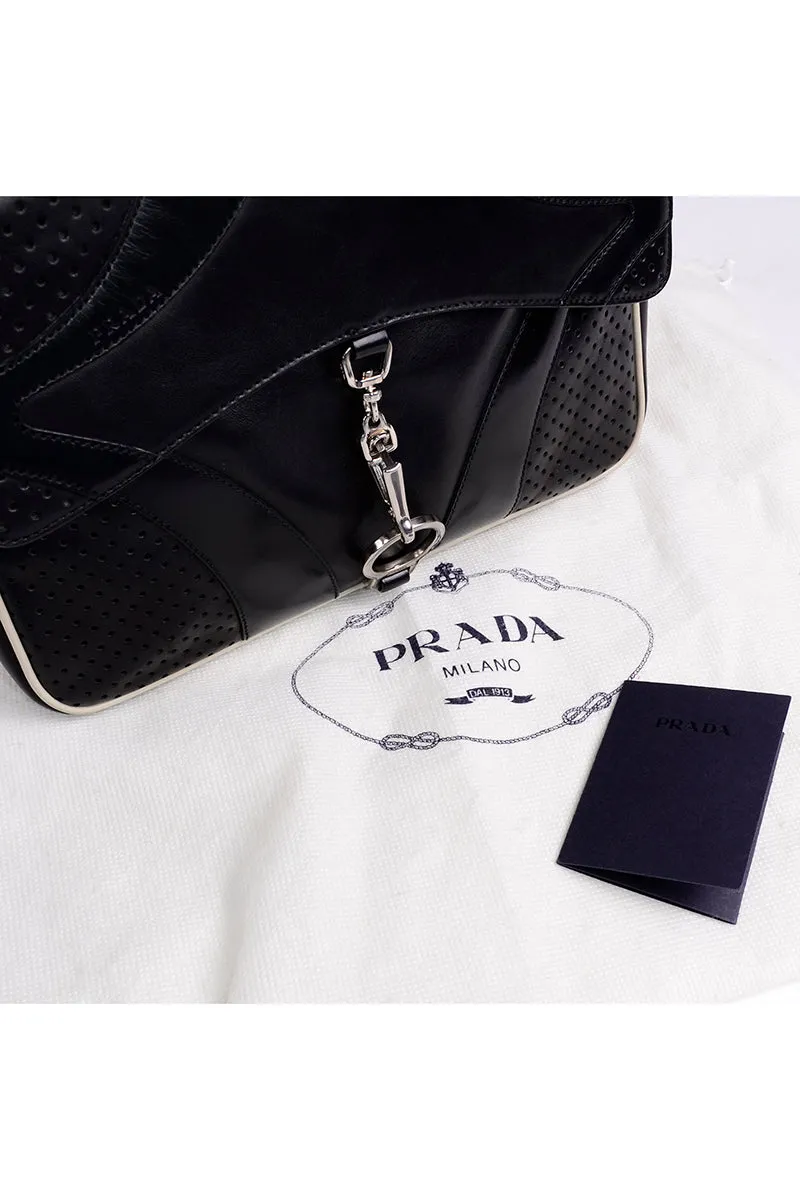 RESERVED // 1990s Prada Black & White Perforated Leather Top Handle Handbag