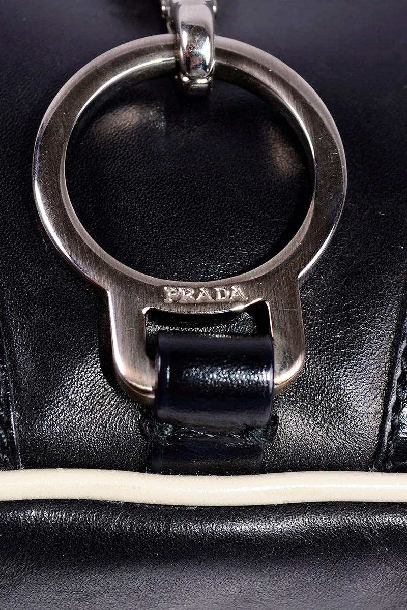 RESERVED // 1990s Prada Black & White Perforated Leather Top Handle Handbag